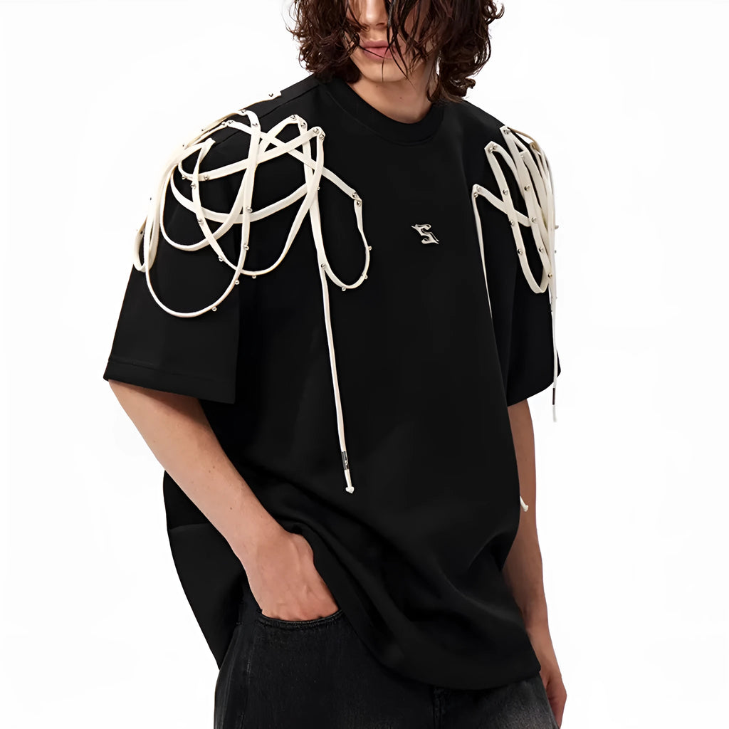 Black loose fit T-shirt with padded shoulders featuring rivet ribbon detailing, short sleeves and round neck collar