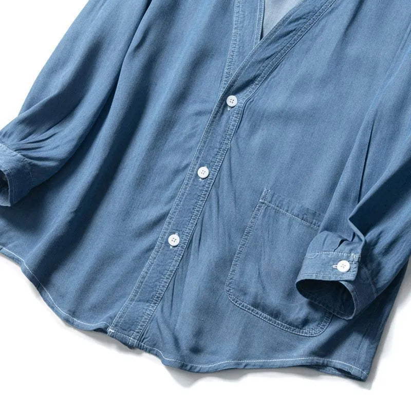 Men's dark blue V-neck denim coat with three-quarter sleeves and loose casual fit