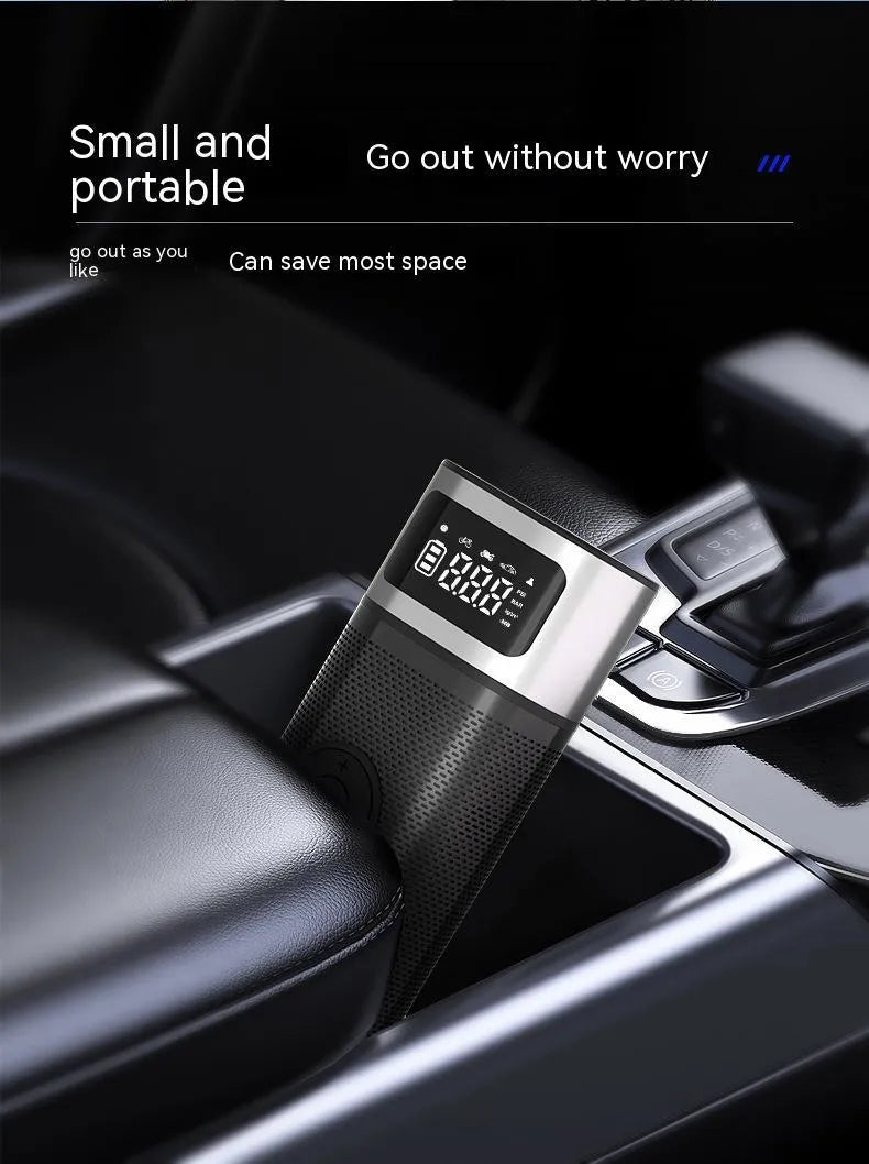 Black portable wireless smart air pump with LED light, USB cable, and nozzles for car, bike, ball, and swimming ring.