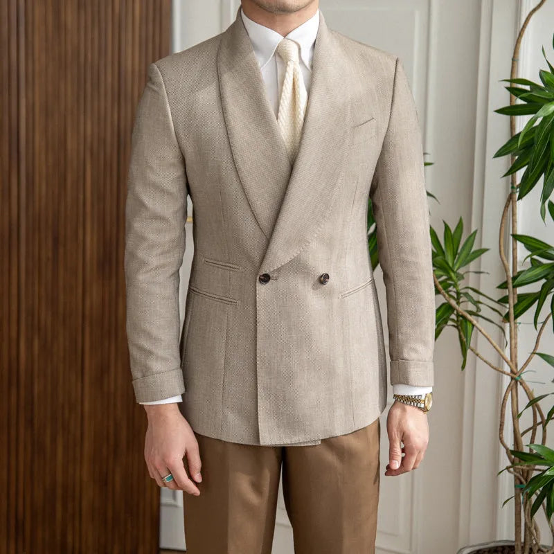 Men's light coffee double-breasted tuxedo suit jacket with notched lapels on a plain background