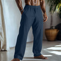 Straight leg casual trousers in a cotton linen blend, shown in one of seven available solid colours.