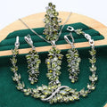 Retro style necklace, earrings, ring, and bracelet set with plants and flowers pattern in olive, purple, and colourful finishes.