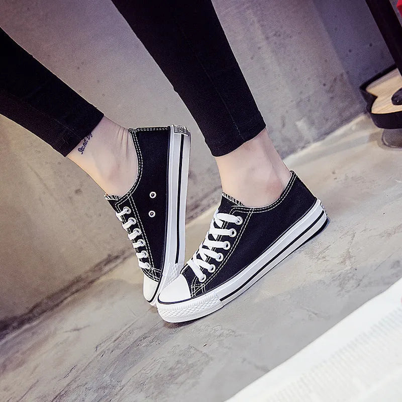 Women's solid-colour canvas shoes in black, white black, white red, or all black colour options