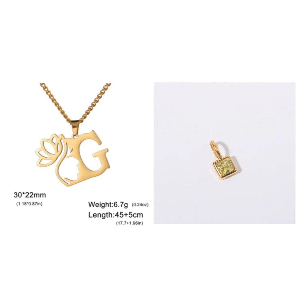 Gold electroplated stainless steel necklace with a cross chain and a letter 'A' pendant on a white background.
