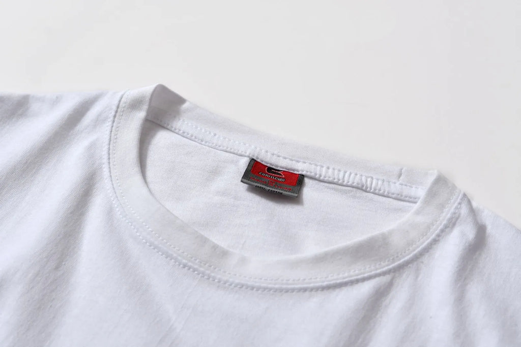 White cotton t-shirt overalls with round neck and short sleeves in loose fit