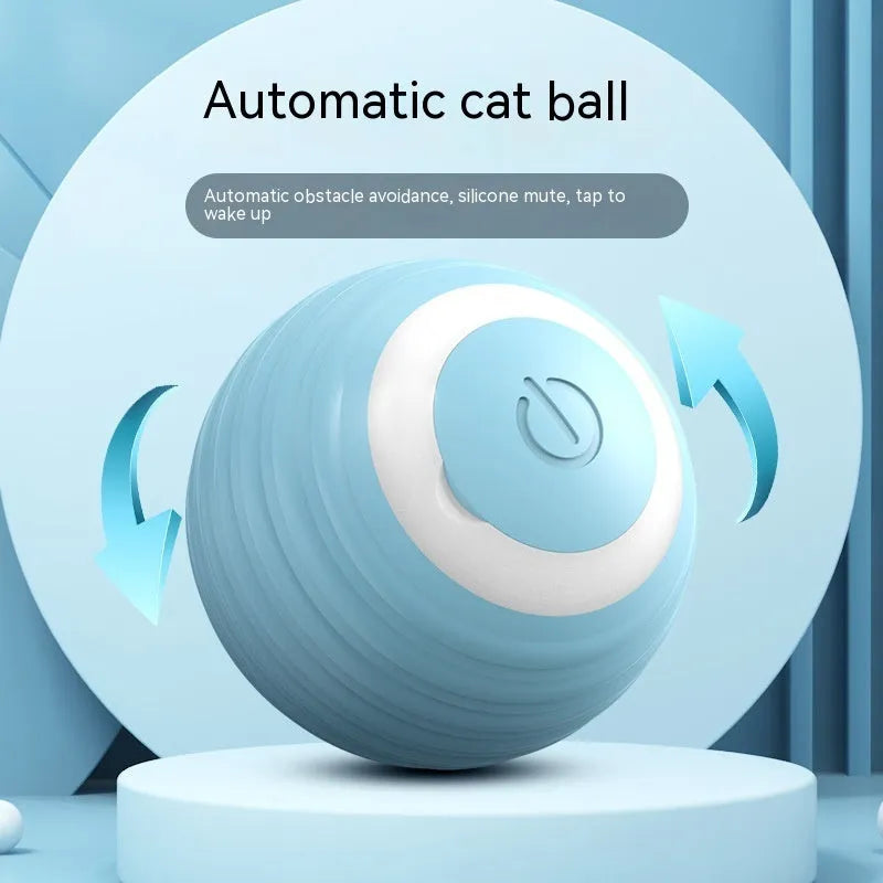 Blue and pink automatic rechargeable moving ball cat toy on a floor.