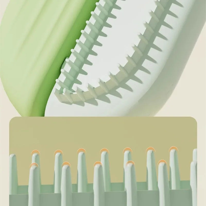Blue pet grooming comb with water tank for dogs and cats on a white background.