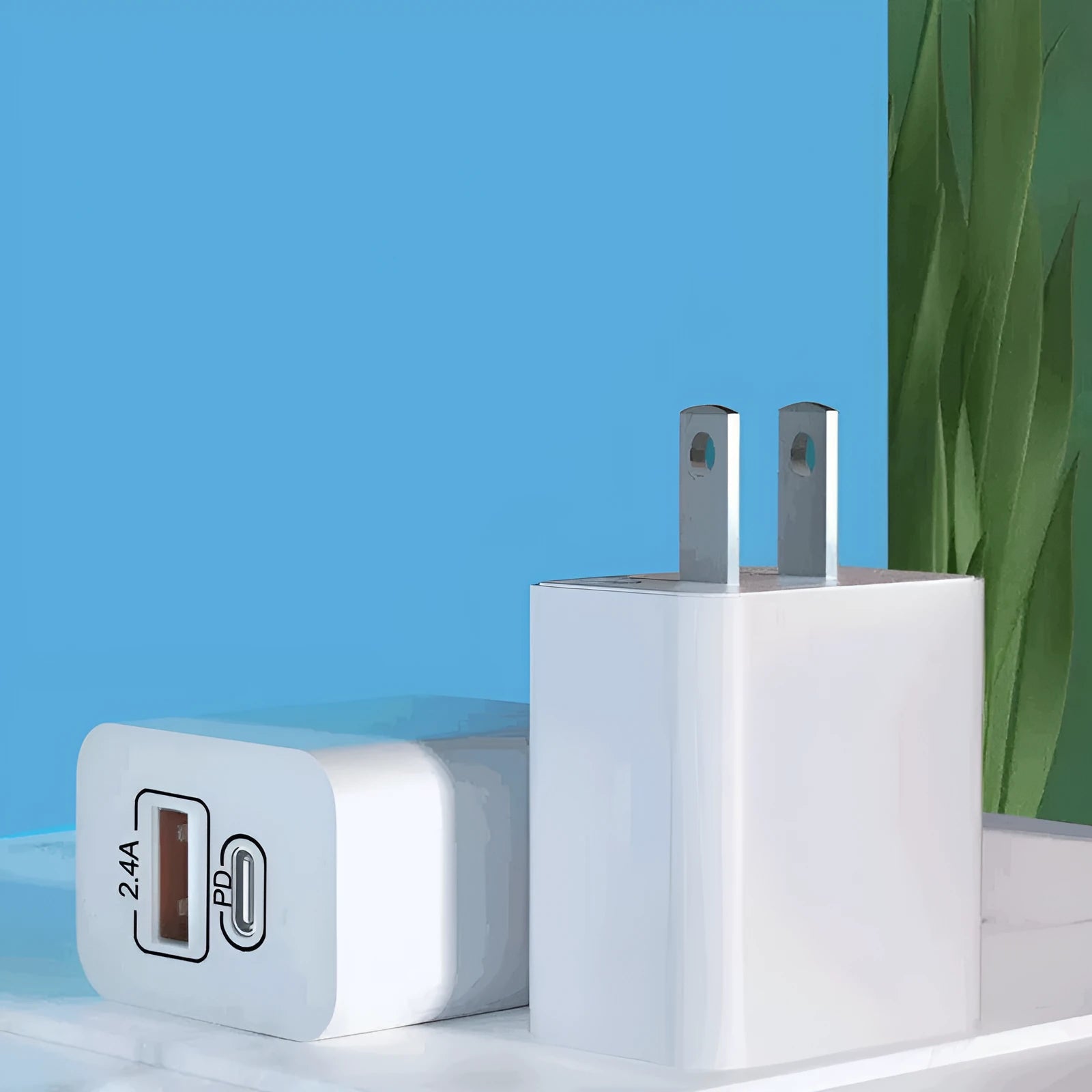 USB travel charger with fast charge PD interface for Android phones showing bare metal construction