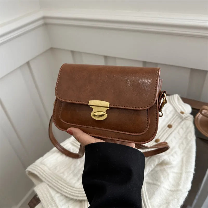 Retro square crossbody bag in PU leather with horizontal suitcase shape, 25 cm width