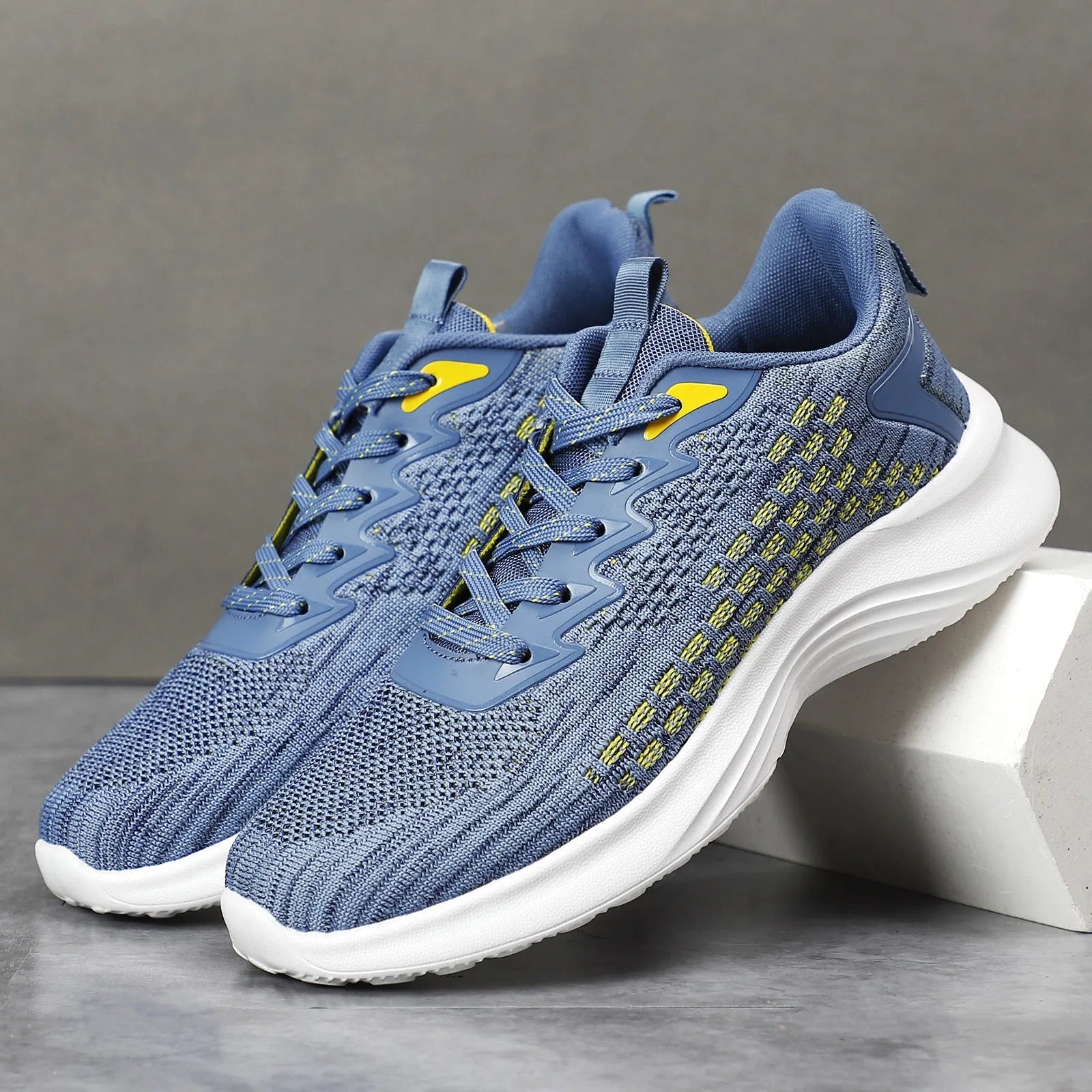 Women's lavender purple and sapphire blue Flyknit running shoes with striped pattern and mesh lining