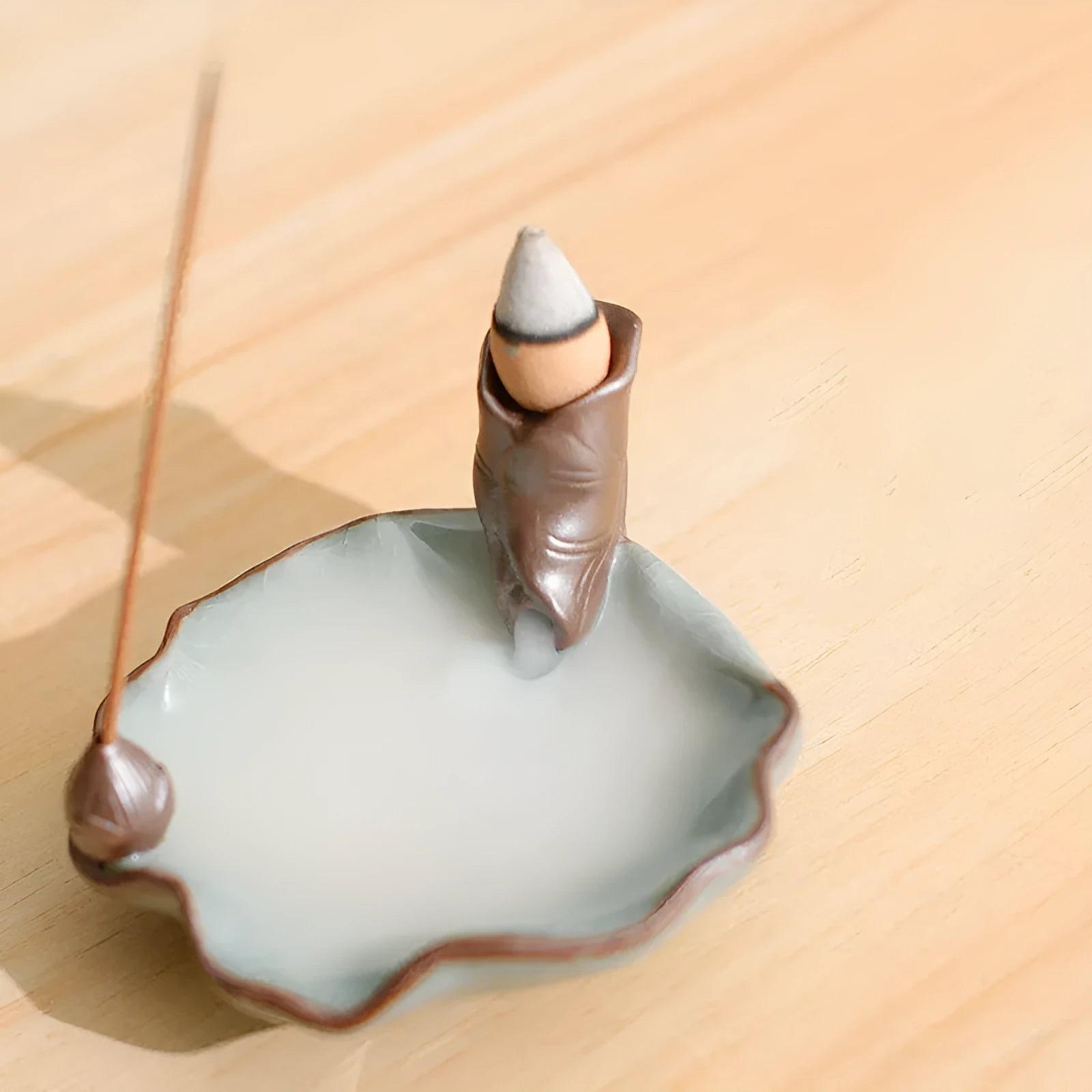 Purple clay ceramic reverse flow incense burner with New Chinese style good luck motifs