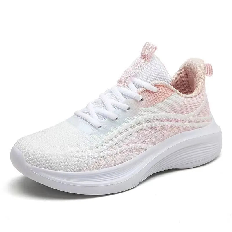 Women's low-top mesh running shoes in light pink with a round toe and front lace-up closure.