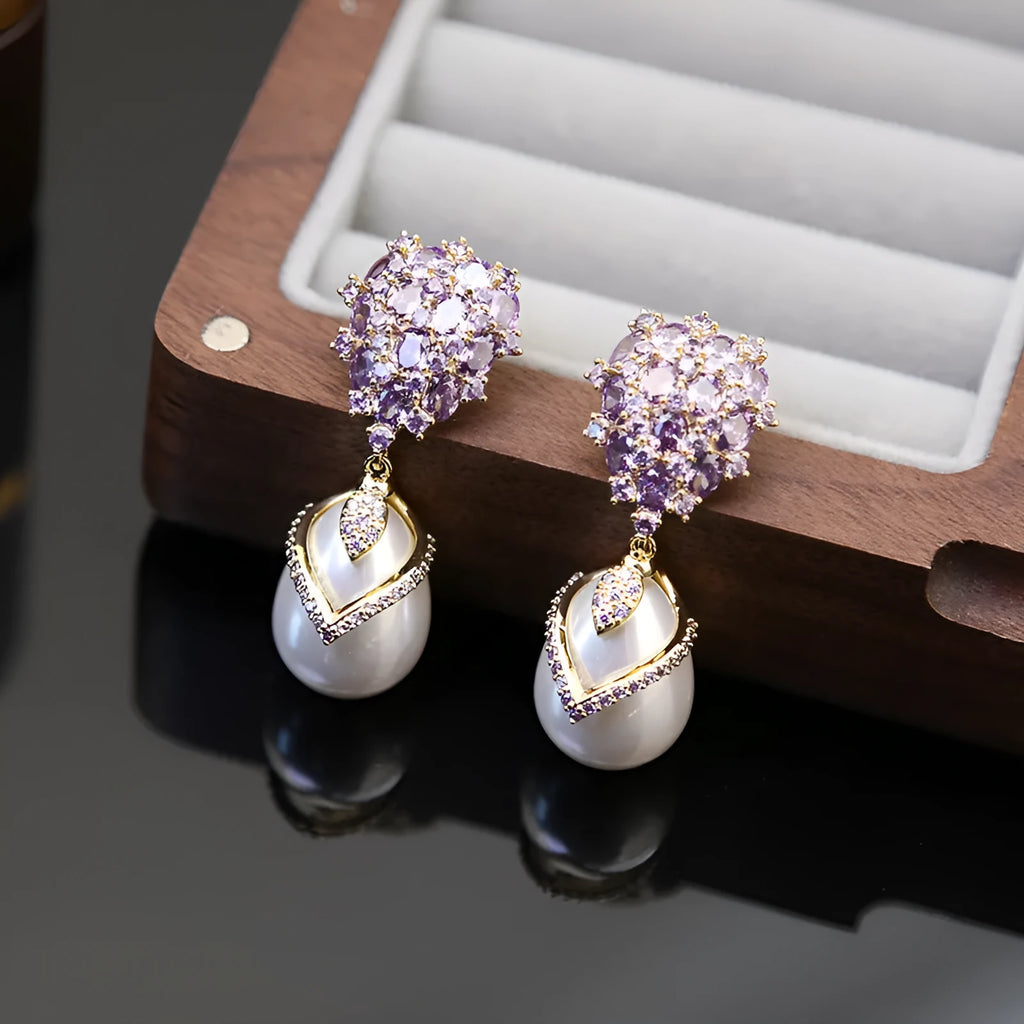 Women's drop shape pearl earrings with zircon accents on 18K gold plated copper setting