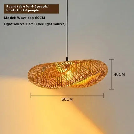 Bamboo hanging lamp with straw hat-shaped rattan weave in natural tones showing light diffusion