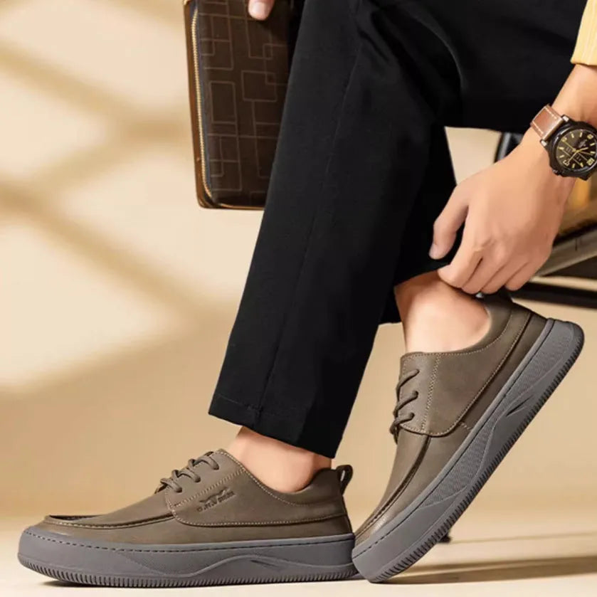 Brown retro casual leather shoes with big toe design and stitching, shown on a white background.