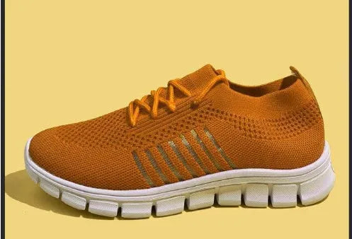 Women's breathable lace-up casual sneakers with flat heel and rubber sole in multiple colour options