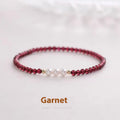 Women's garnet and artificial pearl bracelet with crystal details and adjustable clasp