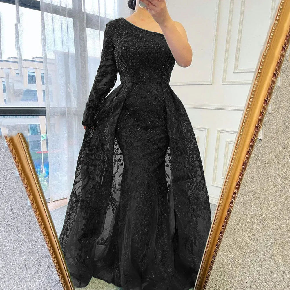 Women's slim-fit fishtail mesh shoulder long-sleeved dress in green with zipper detail on model