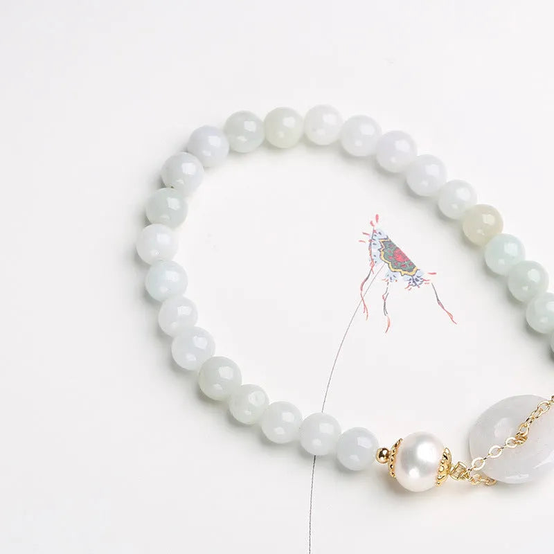 Natural jade peace buckle pearl bracelet with geometric pendant on wrist