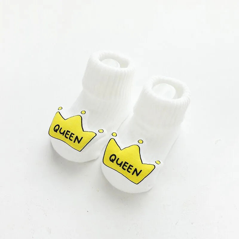 Non-slip baby socks with dispensing glue feature in cotton material, showing mid-calf height and colour options