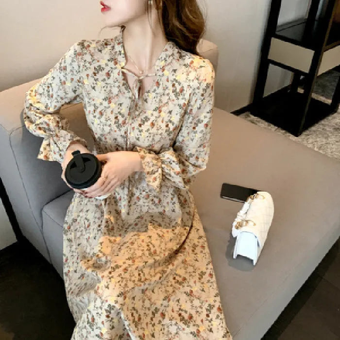 Retro waist-cinching A-line floral dress for women in apricot polyester fabric available in sizes S to 2XL