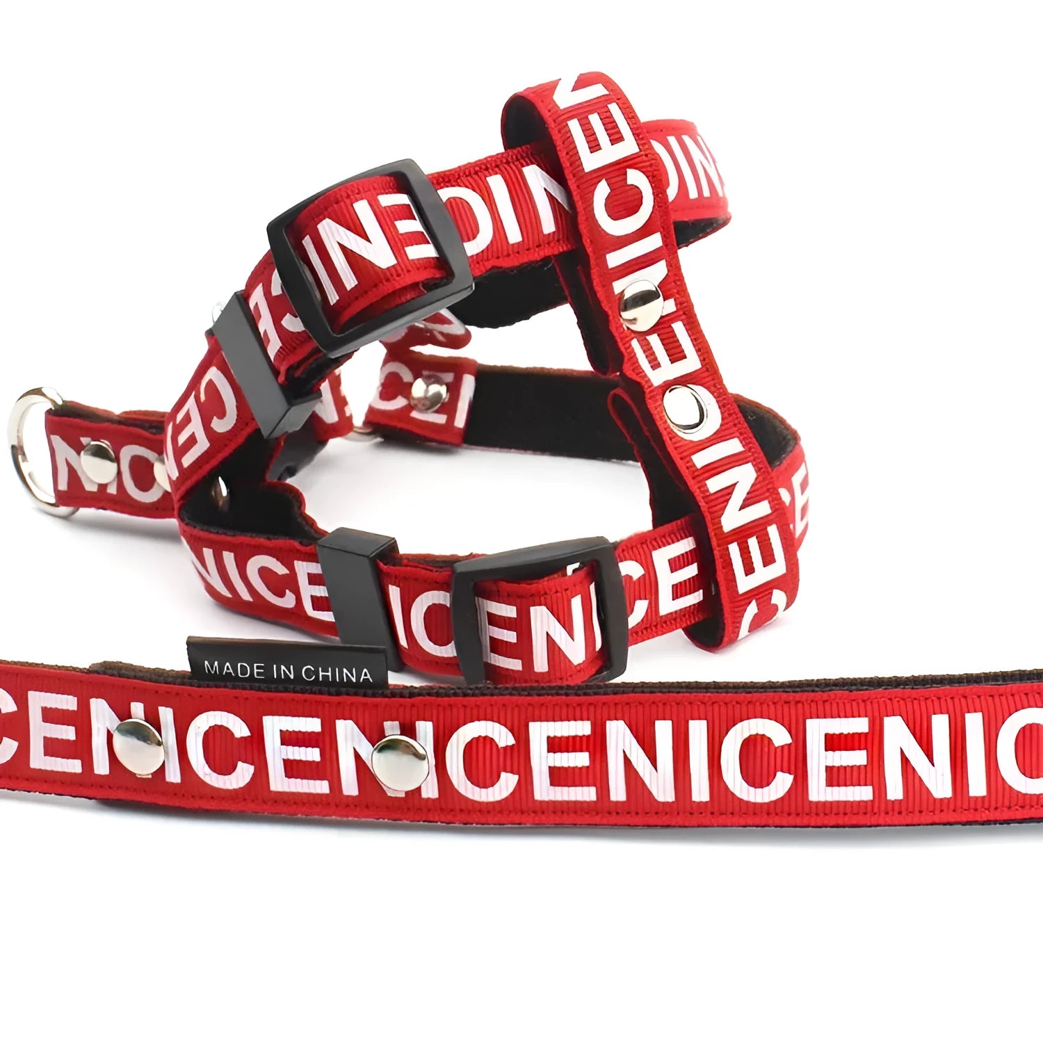 Black polyester traction dog collar with hand-holding rope on a light background