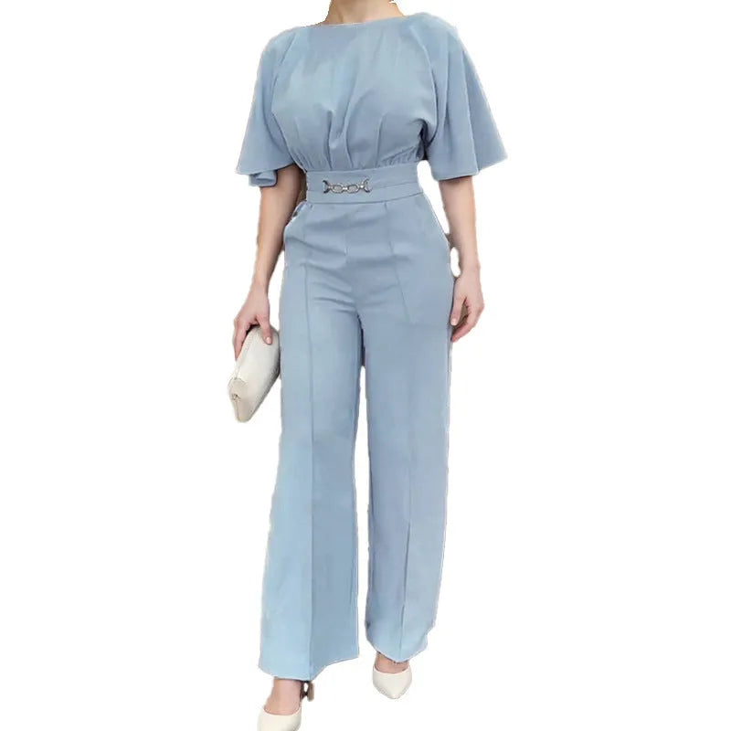 Blue polyester men's suit set with long sleeve jacket and trousers on a hanger.