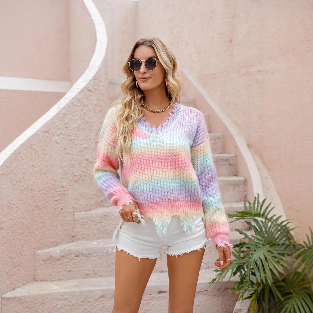 Pink rainbow gradient knitted loose pullover sweater with tassels on hanger