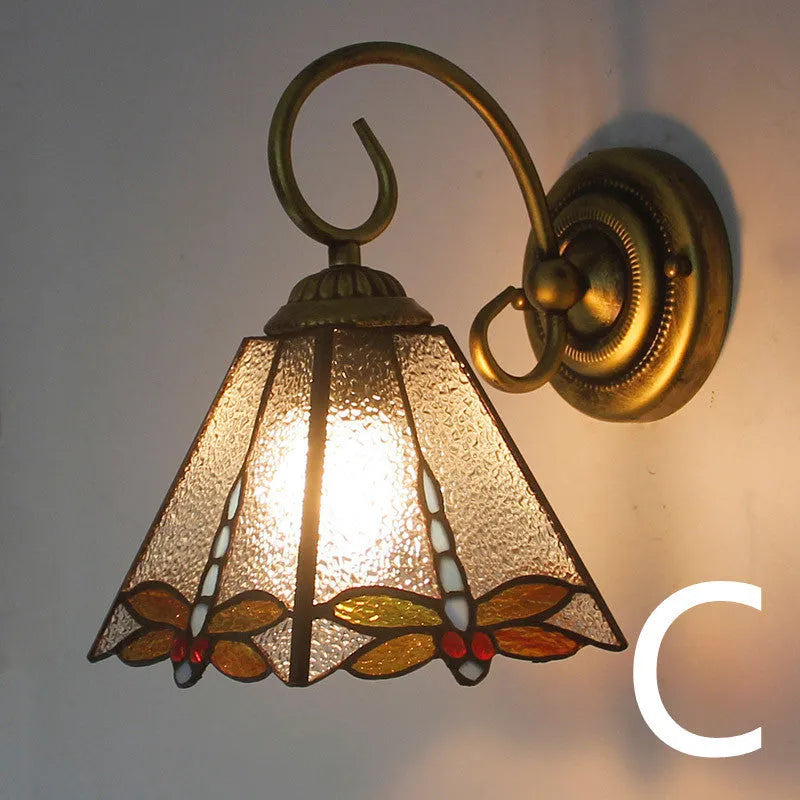 A simple modern stained glass wall lamp for corridors, shown in one of six available coloured styles.