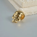 Stainless steel hollow skull Buddha earring in geometric hip hop style.