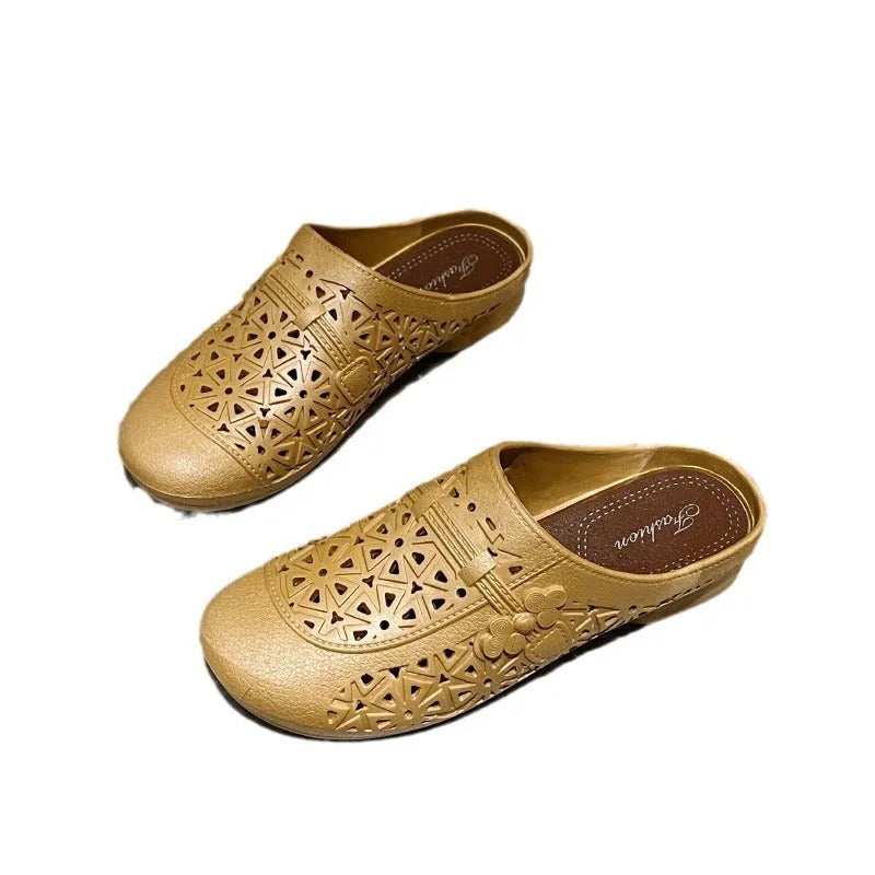 PVC flat toe box half slippers with hollow-out fairy style design in apricot colour.