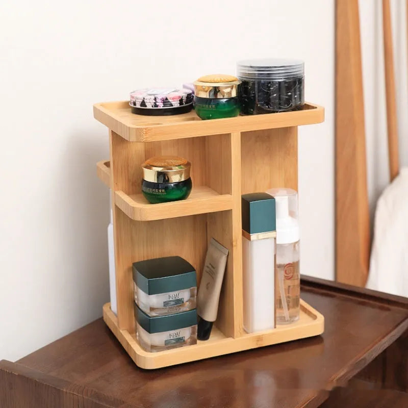 Natural bamboo rotating storage rack with multiple shelves and grid compartments.