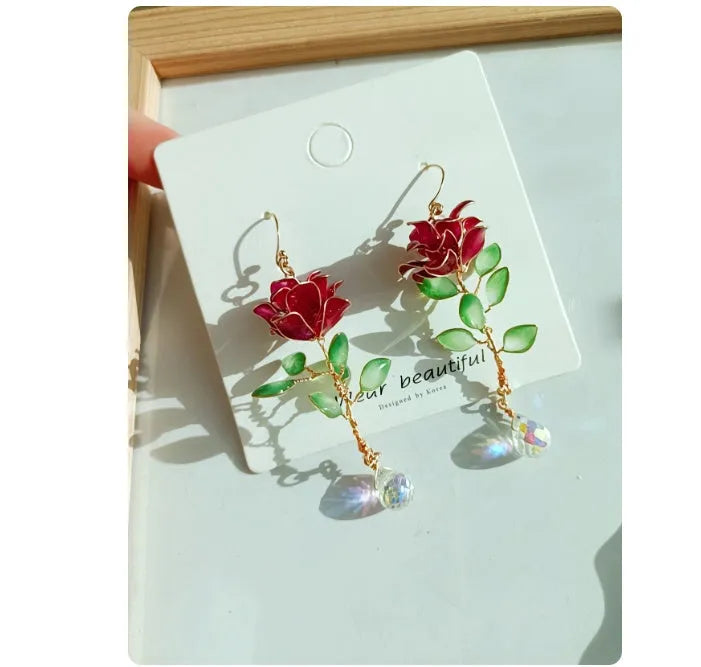 Red flower-shaped liquid ornament earrings with tea fragrance for women