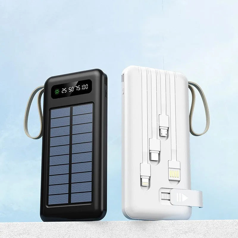 Black and white solar power bank showing size, solar panel, and USB ports for charging phones outdoors.