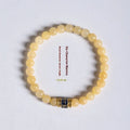 Women's hand-woven topaz bracelet with 6mm mantra barrel beads and square jade charms
