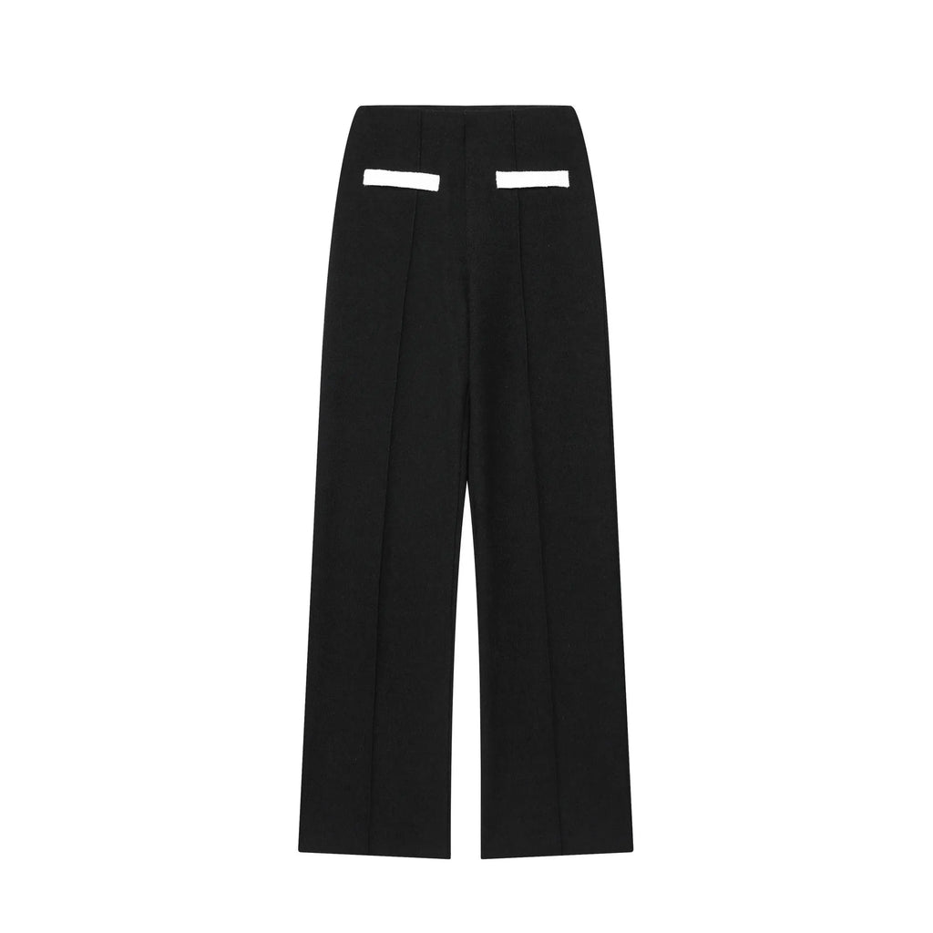 Women's beaded leather-look top and high-waisted trouser two-piece suit set in contrasting colours.
