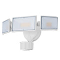 White LED security flood light with motion sensor mounted on an exterior wall.