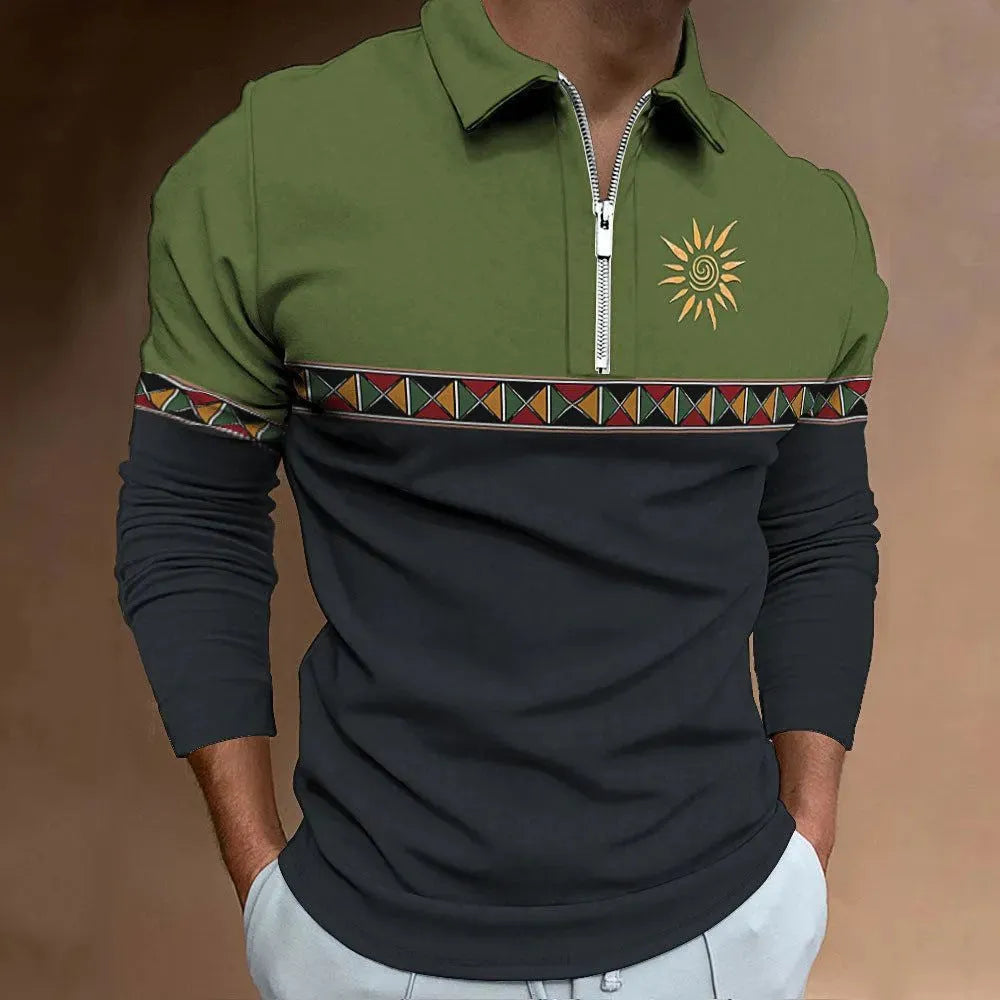 Man wearing a loose-fit, long-sleeve t-shirt with retro colour stripes and zipper decorations.