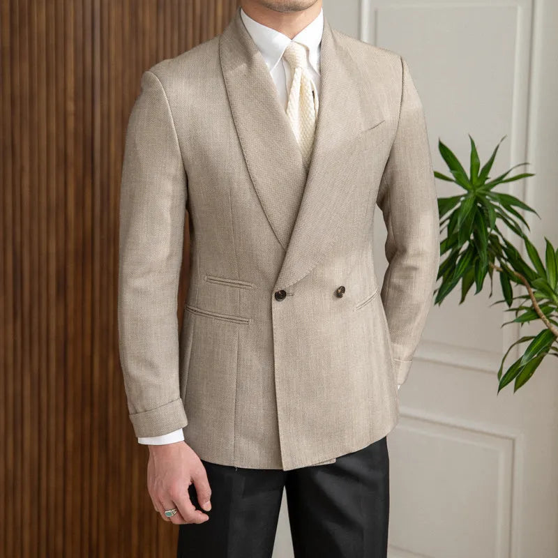Men's light coffee double-breasted tuxedo suit jacket with notched lapels on a plain background