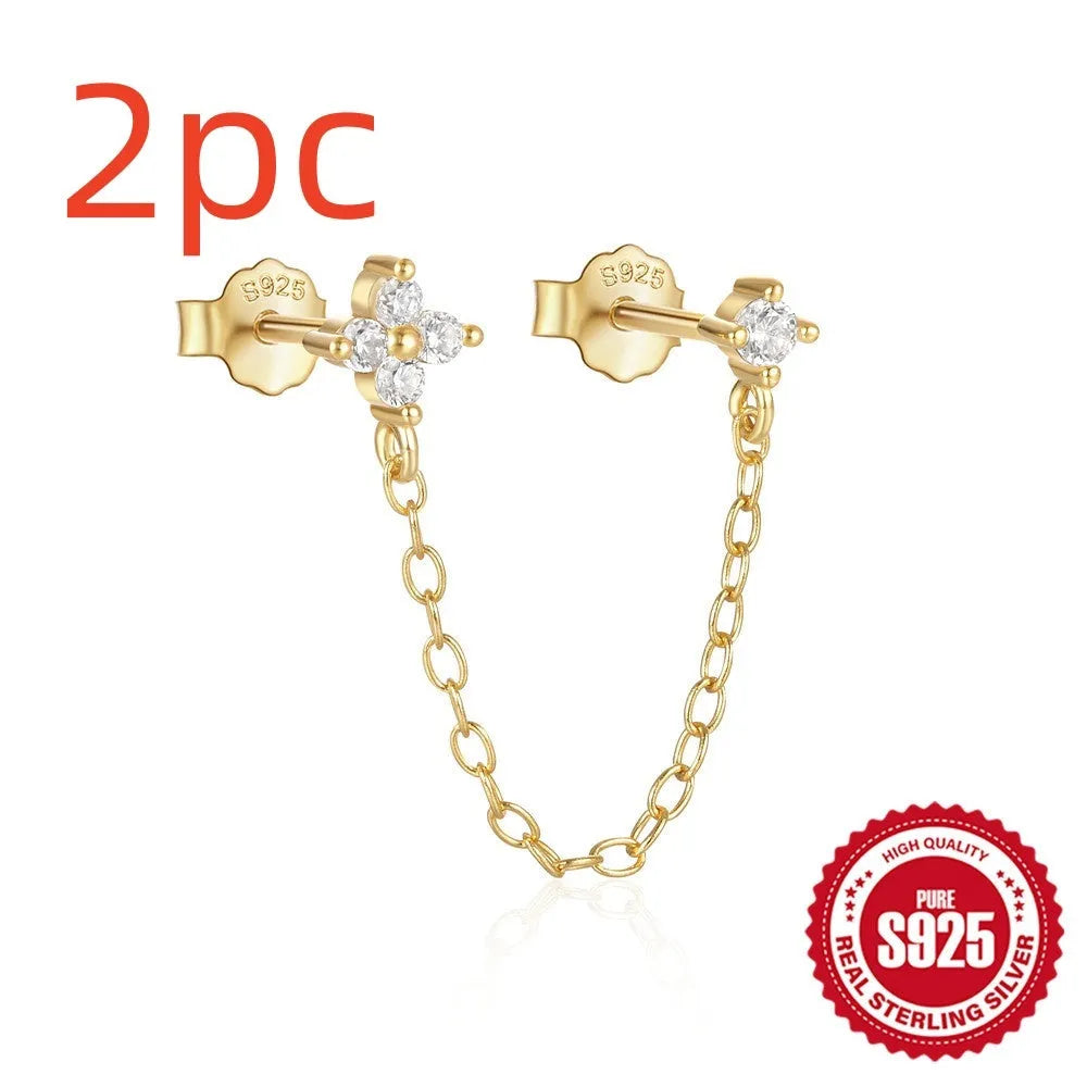 S925 sterling silver ear stud with geometric diamond flower, tassel, and chain design in a gold colour.