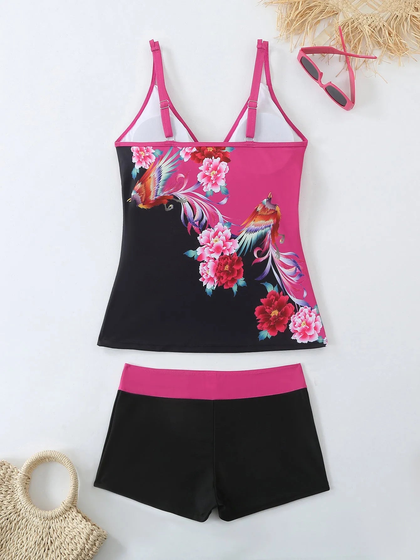 Women's plus size printed two-piece swimsuit set in black or rose red.