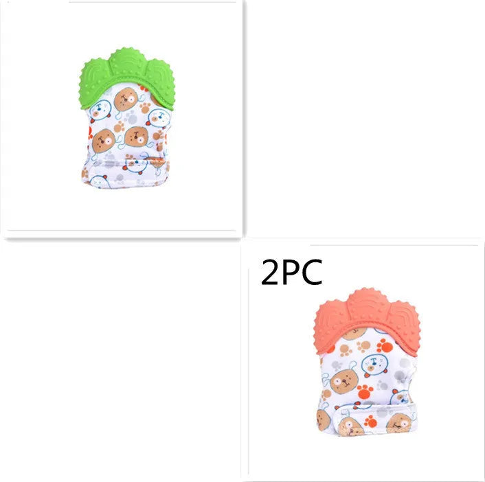 BPA-free silicone baby teether glove fastened with a white Velcro strap on a baby's hand