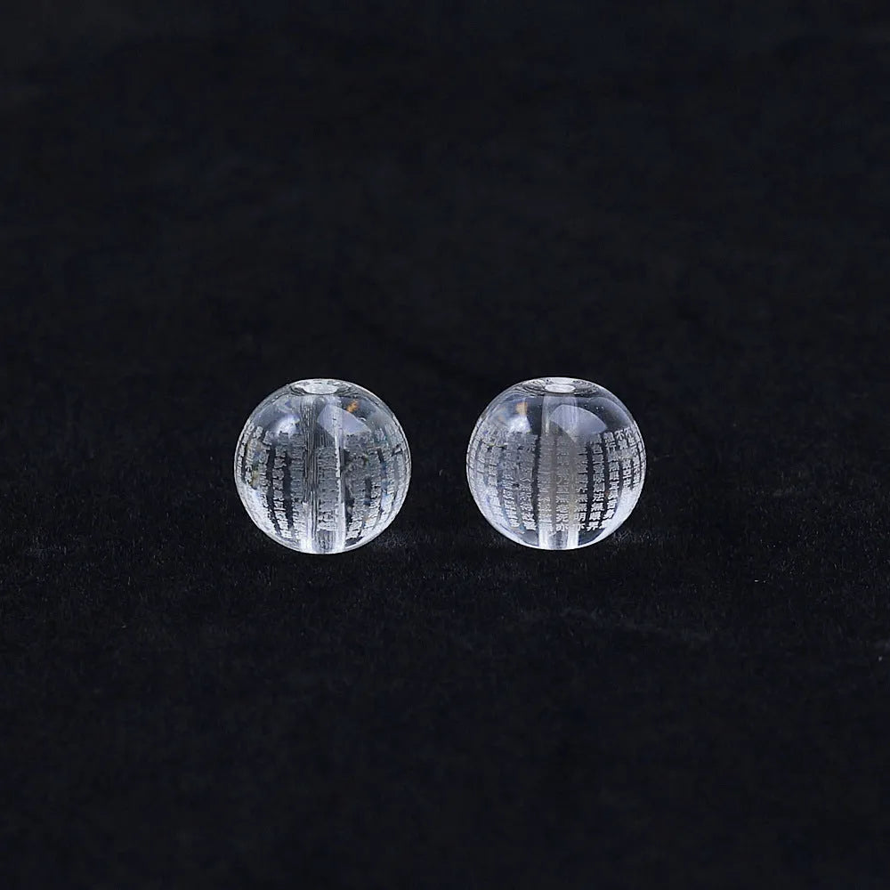 Glass meditation beads engraved with Heart Sutra mantras in three size options