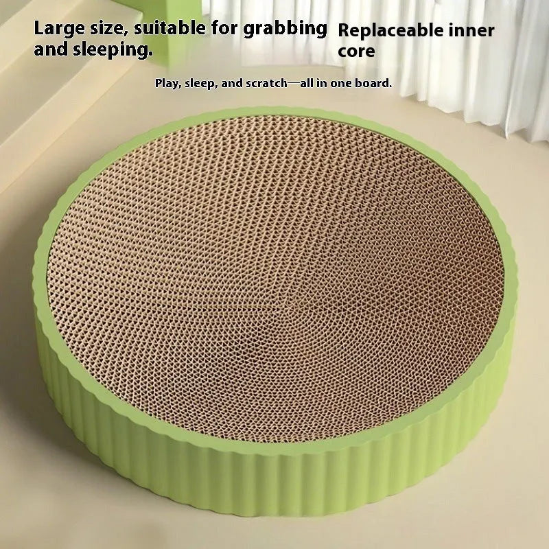Round green and white cat scratching board with corrugated paper centre and two replacement refills.
