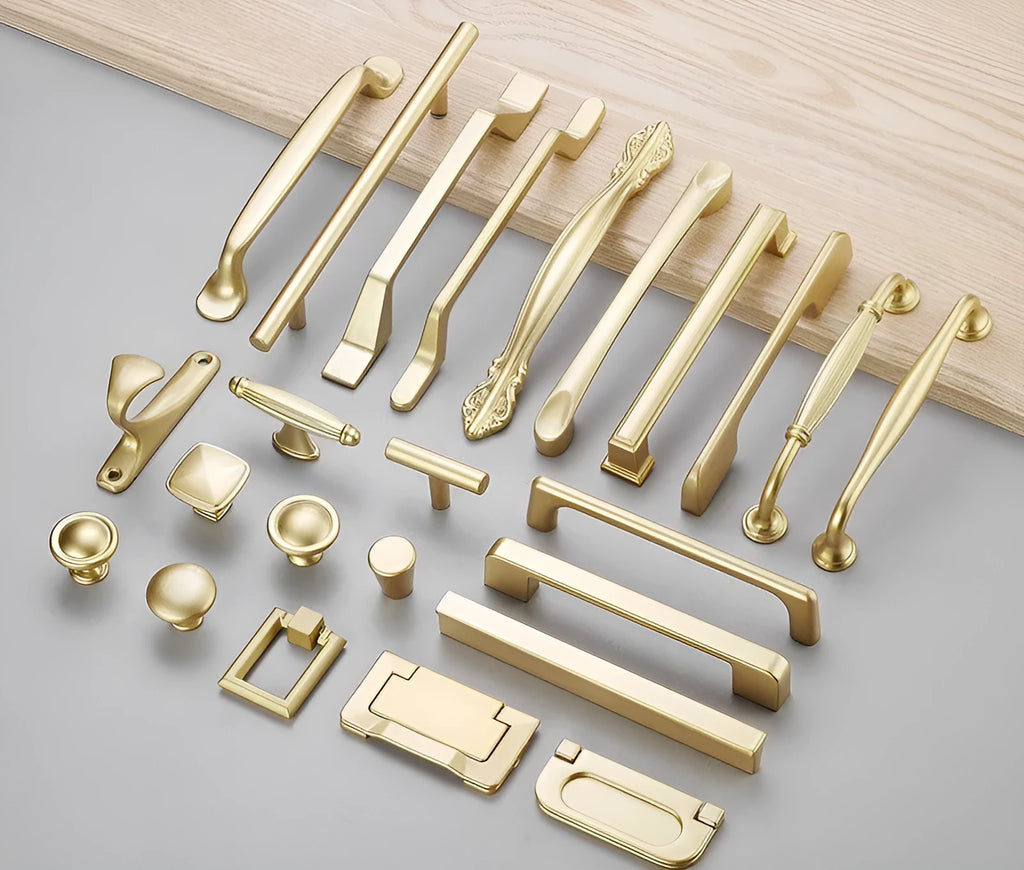 Modern gold T-shape single-hole cabinet handle made of aluminium alloy.