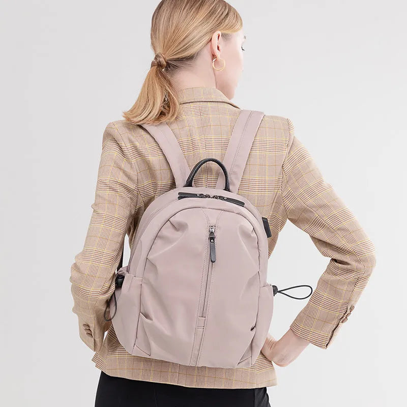 Women's Korean-style simple business travel backpack in dirty pink, Oxford cloth, with computer pocket, small A4 size