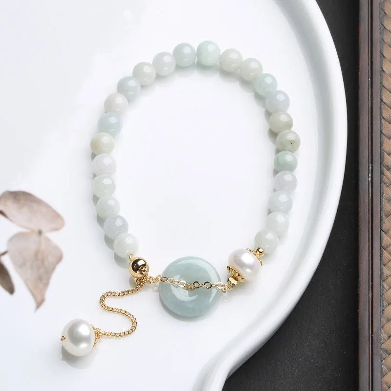 Natural jade peace buckle pearl bracelet with geometric pendant on wrist