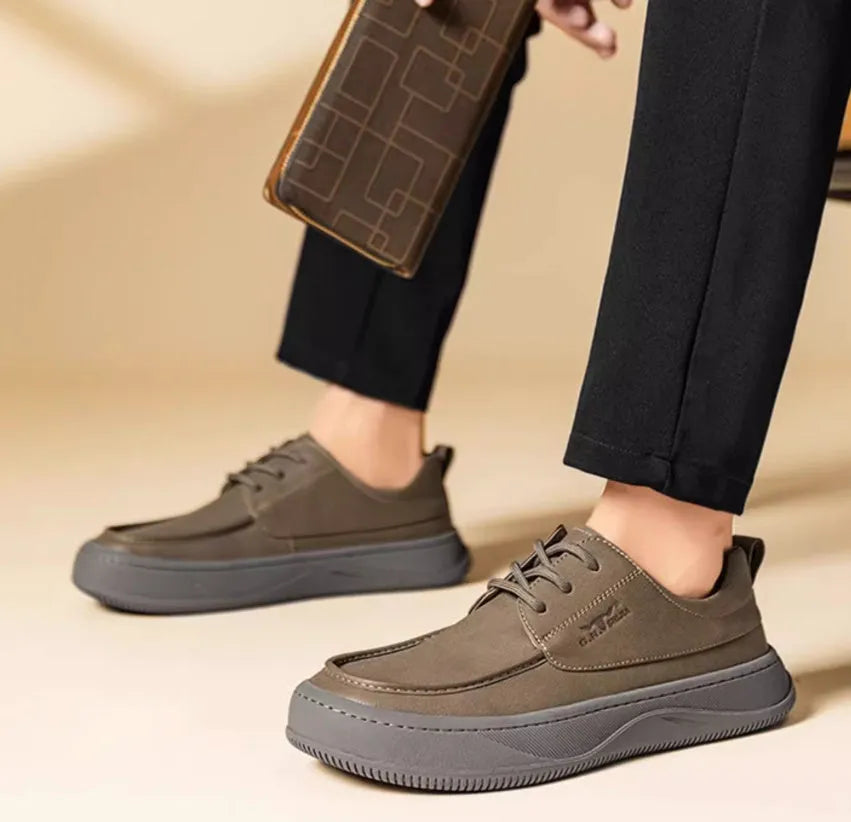 Brown retro casual leather shoes with big toe design and stitching, shown on a white background.