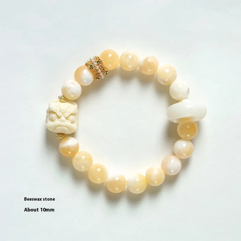 Hand-woven gray agate and mellite bracelet with 10mm round beads