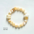 Hand-woven gray agate and mellite bracelet with 10mm round beads